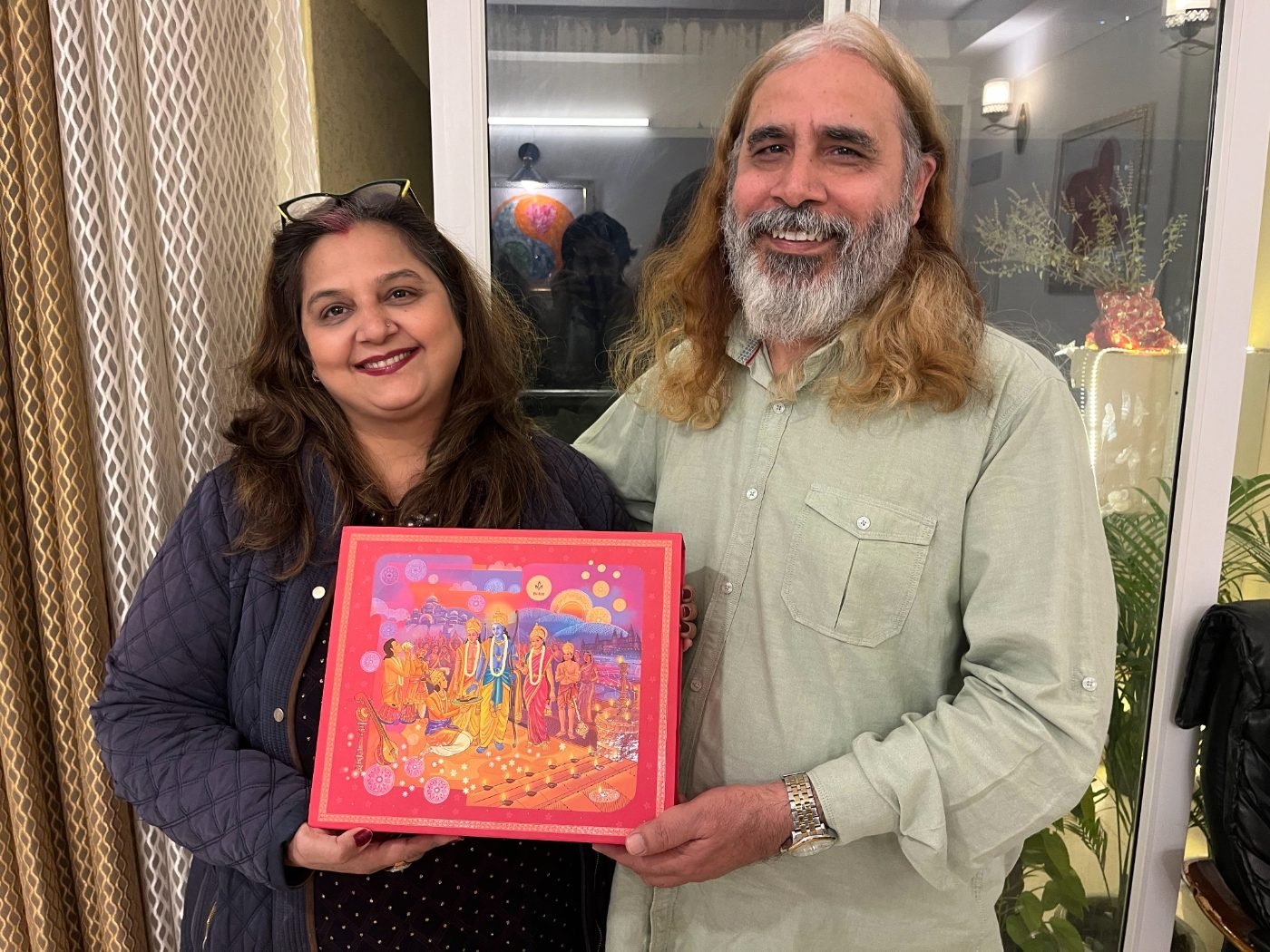 Manu Shandilya Ji with a visitor after a consultation